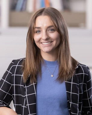 portrait of a smiling person in professional attire